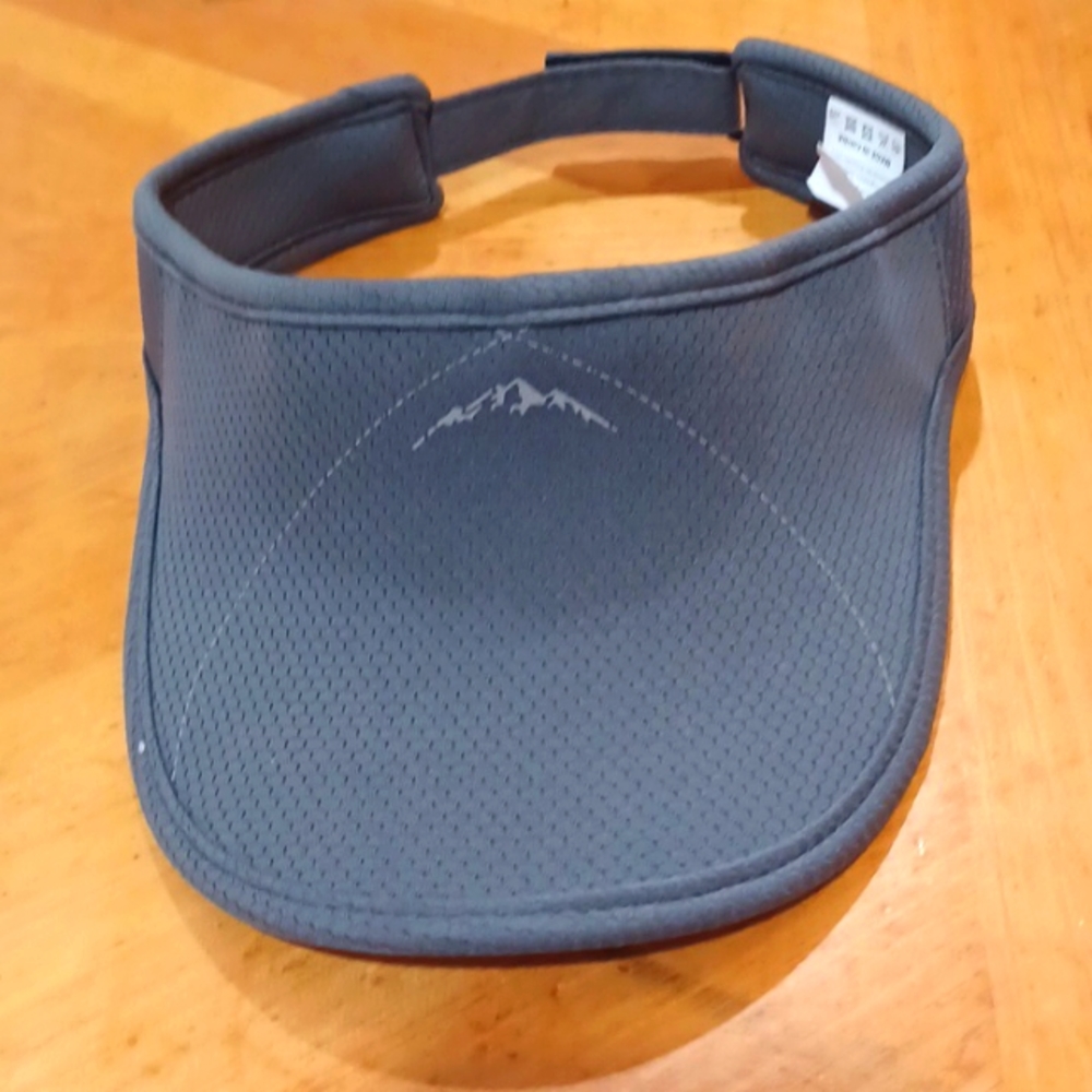 Women's sun viser. NEVER BEEN USED.